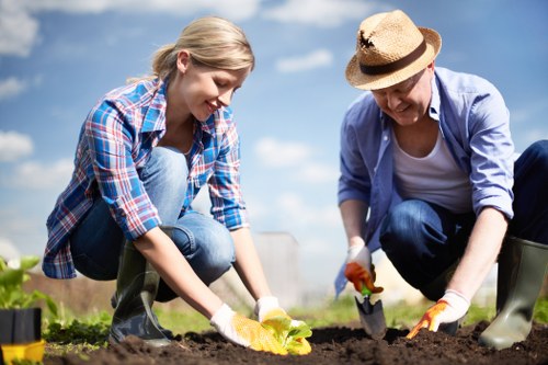 Gardener preparing a garden service agreement